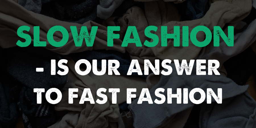 Slow fashion is our answer to fast fashion. Photo of a pile of clothes
