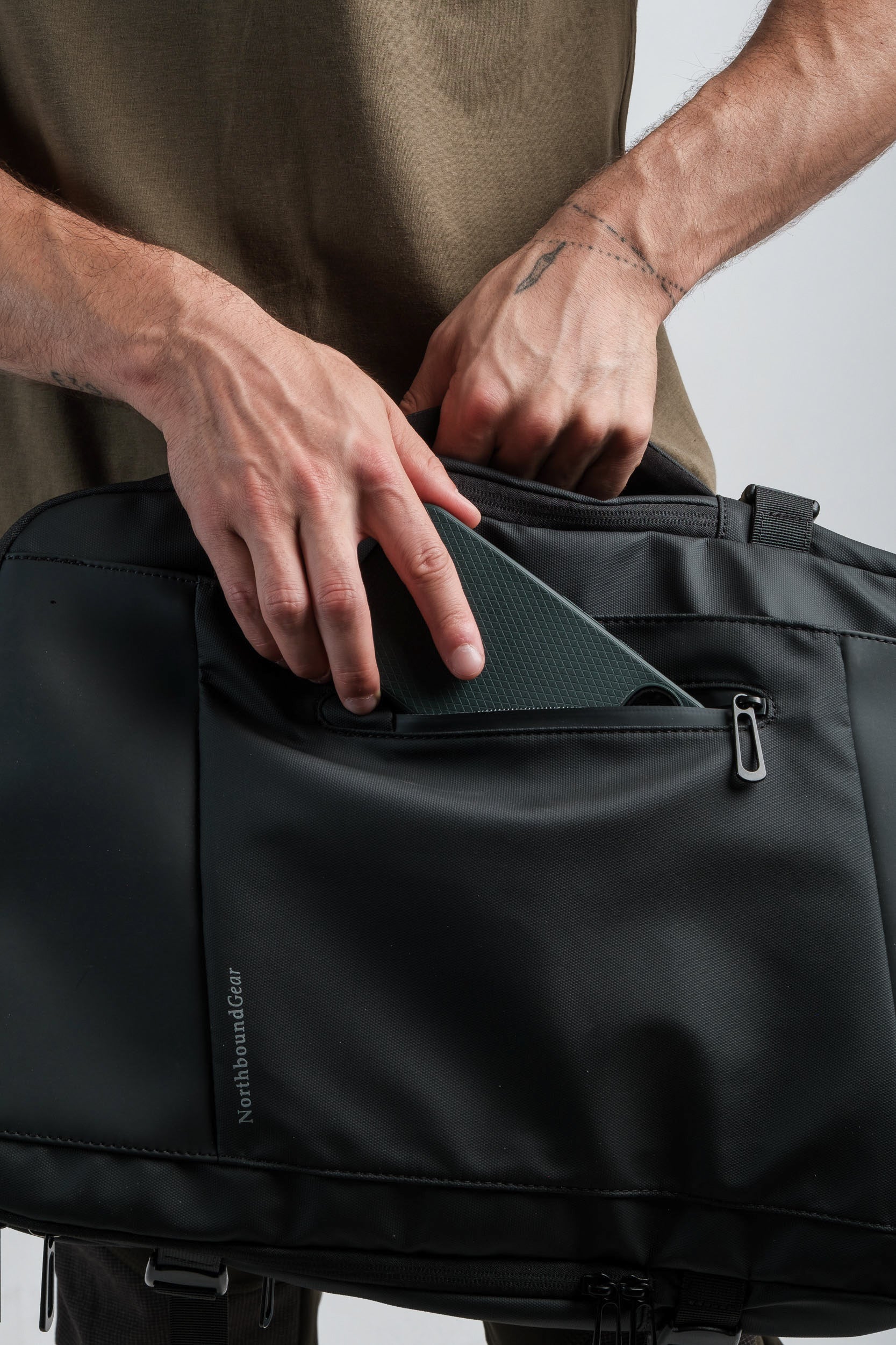 "Voyager" Expandable Backpack 26L / 38L with Built-in Rain Coat